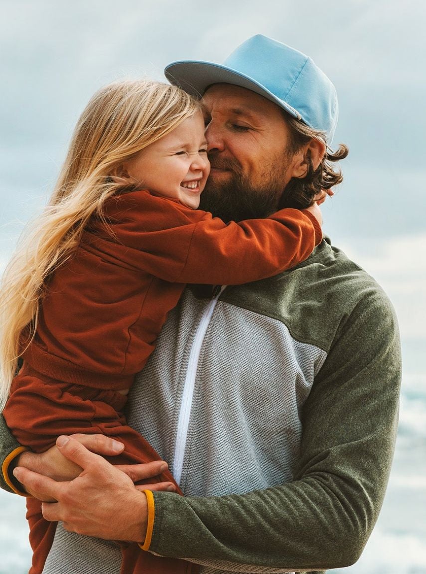 Father and daughter at beach